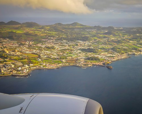 Aerial view from a plane window of the Azores islands in the middle of Atlantic ocean.