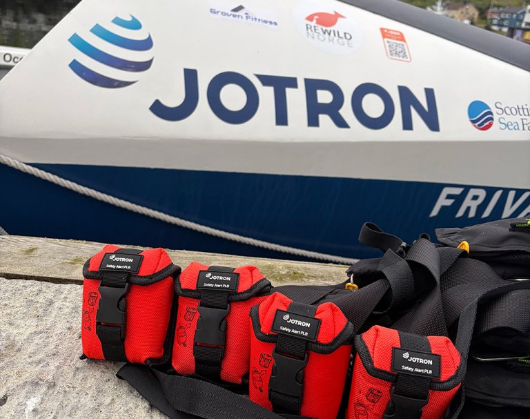 Tron SA20 PLBs in front of the Nordic Endeavour expedition's boat.