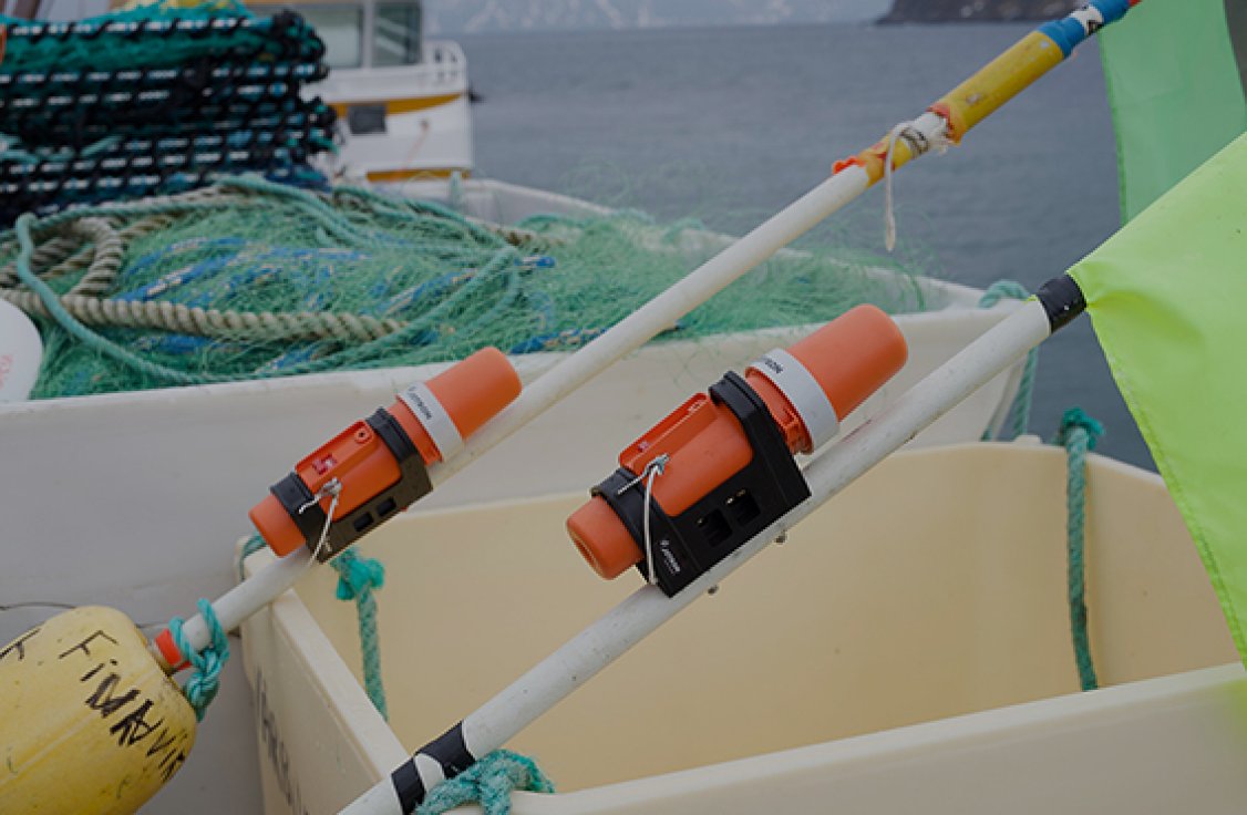 Two TronTrackers laying in the boat.